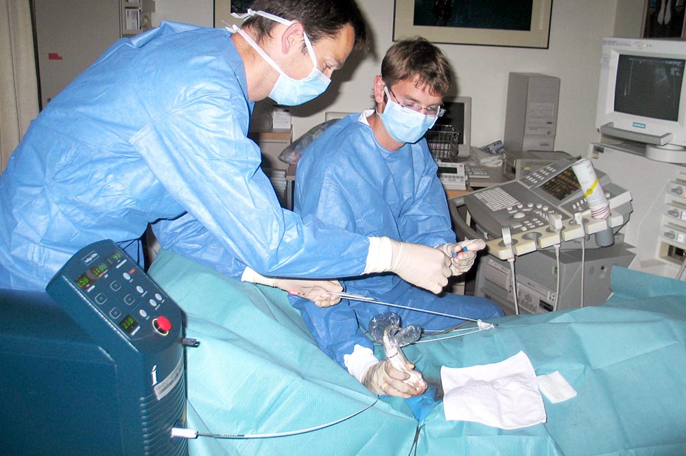 Sonographisch gesteuerte Lasertherapie.